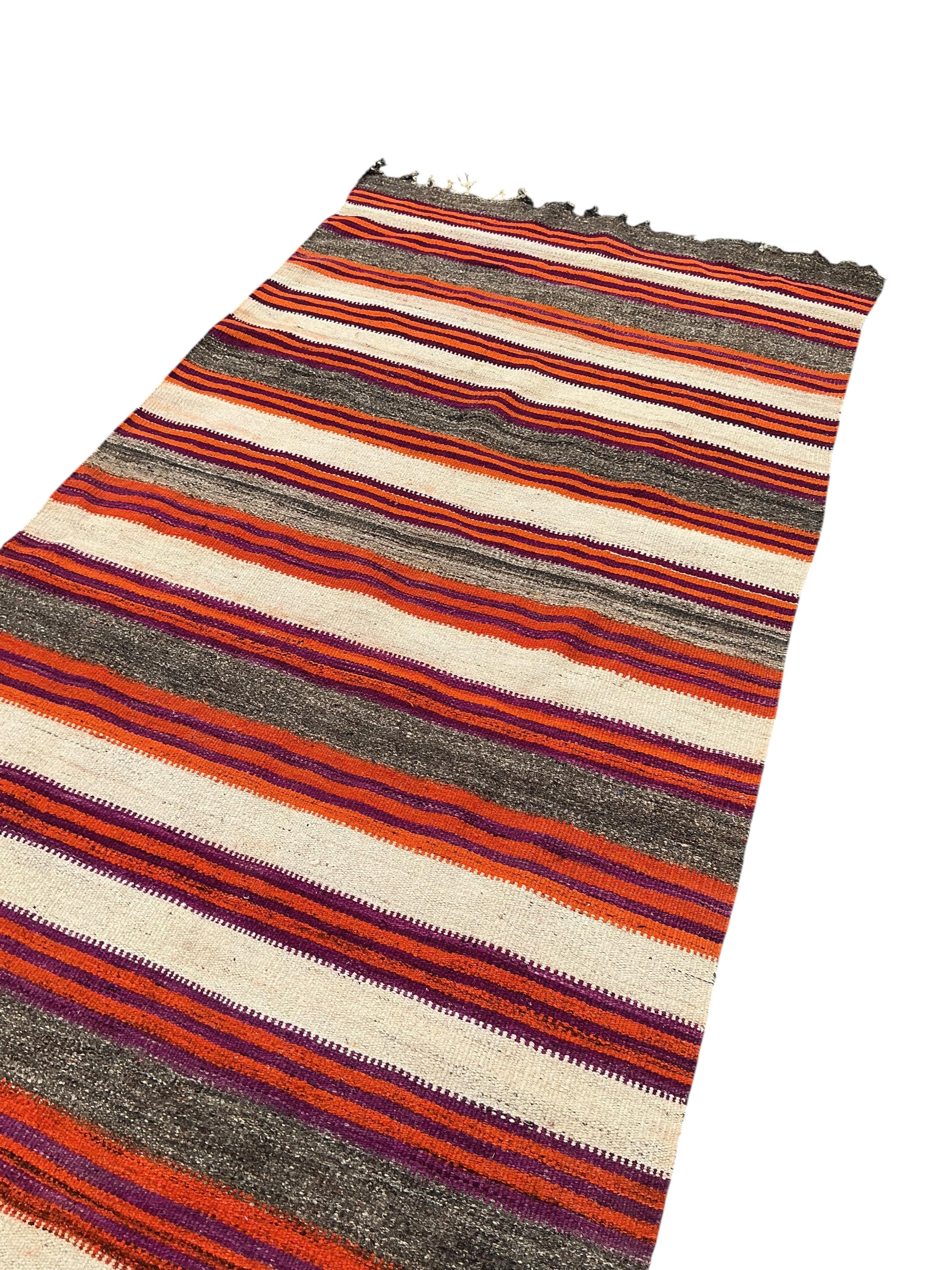 A Turkish kilim carpet, 280 x 140cm